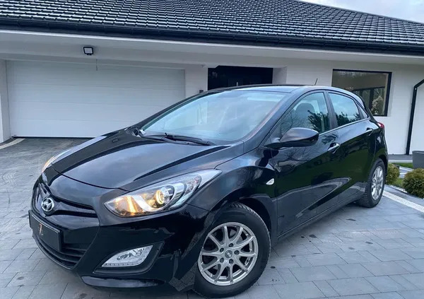 samochody osobowe Hyundai I30 cena 33900 przebieg: 150000, rok produkcji 2013 z Radzymin